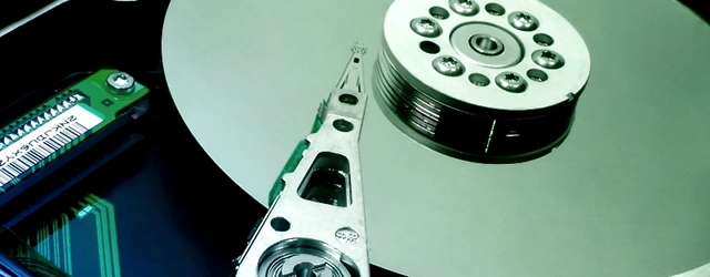 A hard drive arm and platter