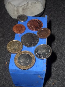 A shiny set of coins in circulation in 2000, head side up
