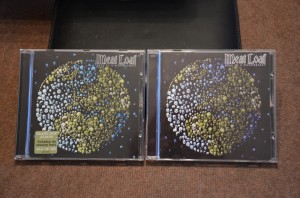 One genuine CD, one suspected fake