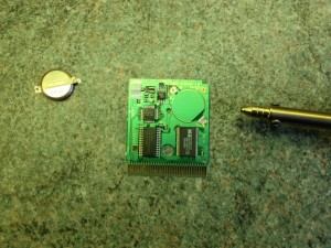 The battery removed from the game's PCB