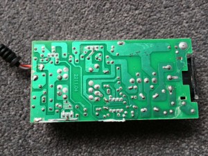 The bottom of the PCB in the power brick